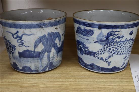 A pair of Chinese blue and white qilin ice pails height 20cm